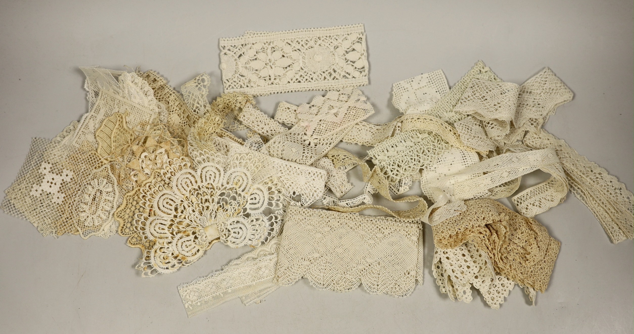 A collection of mixed 20th century lace trim, inserts and appliqués